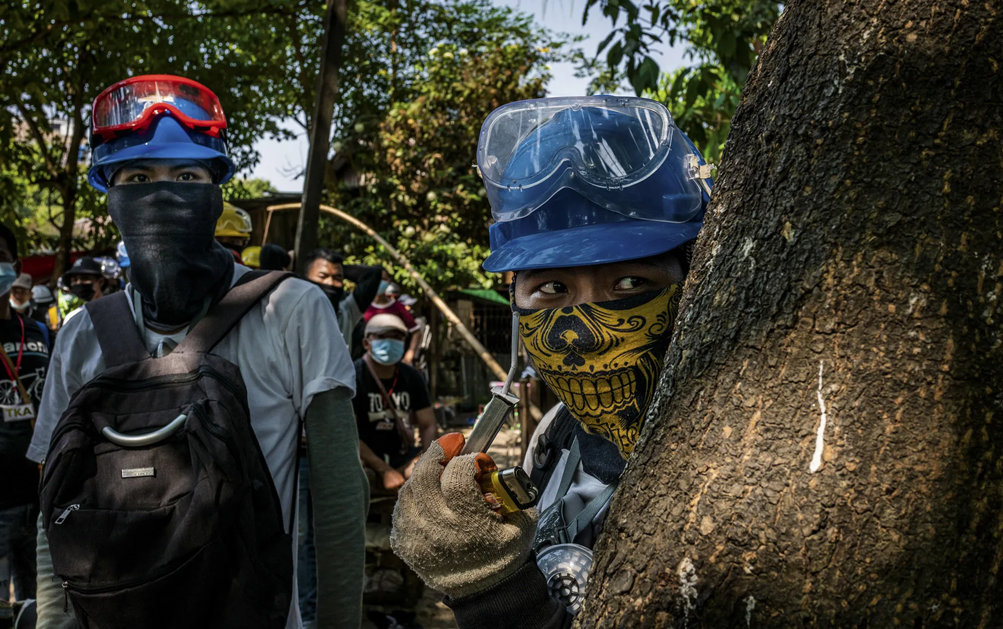 Protesters lookout for military junta forces&nbsp;in Yangon, Myanmar on March 20.&nbsp;