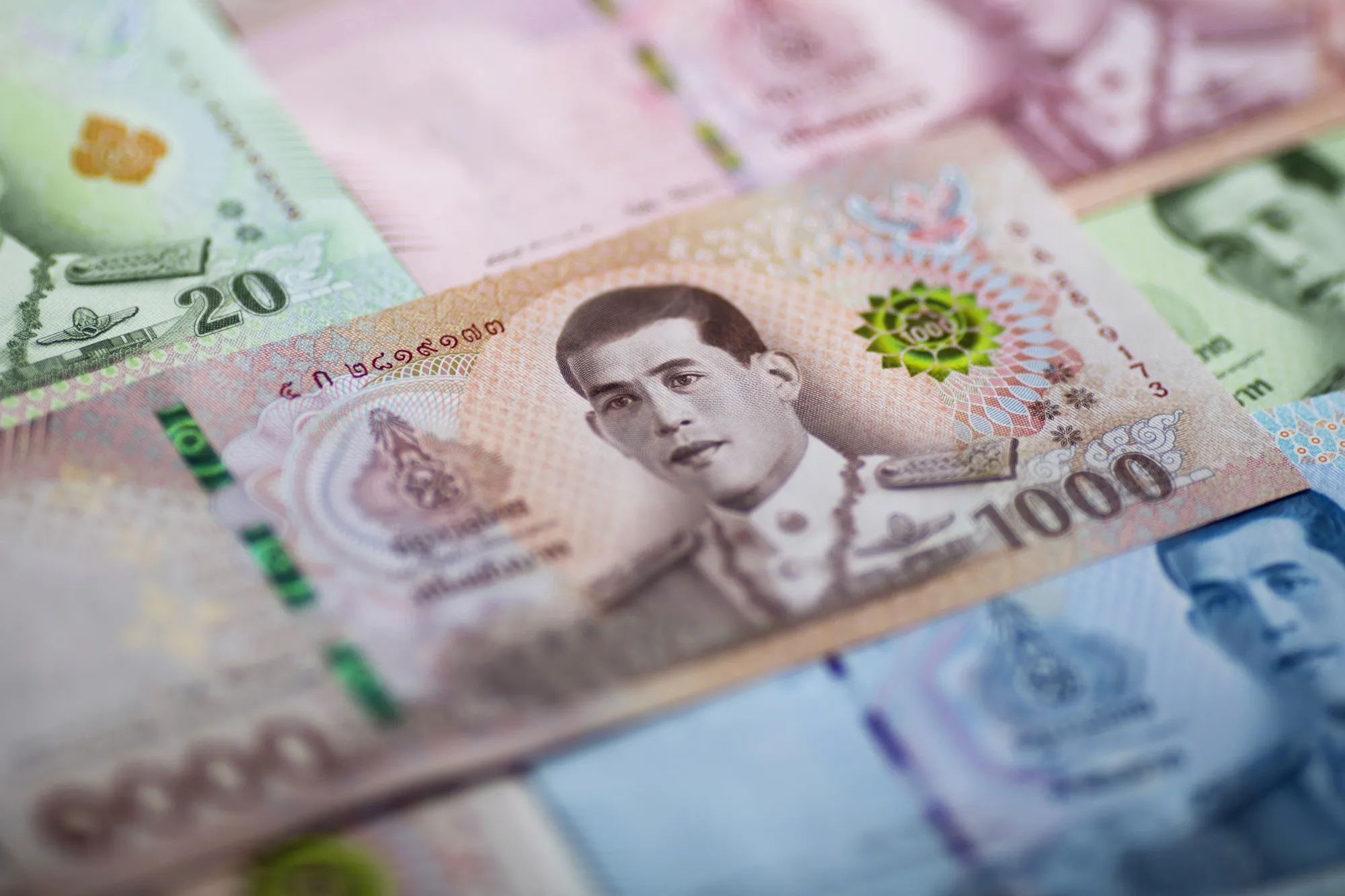 The portrait of Thai King Maha Vajiralongkorn is displayed on a 1,000 banknote baht in an arranged photograph in Bangkok, Thailand, on Wednesday, Sept. 12, 2018.&nbsp;