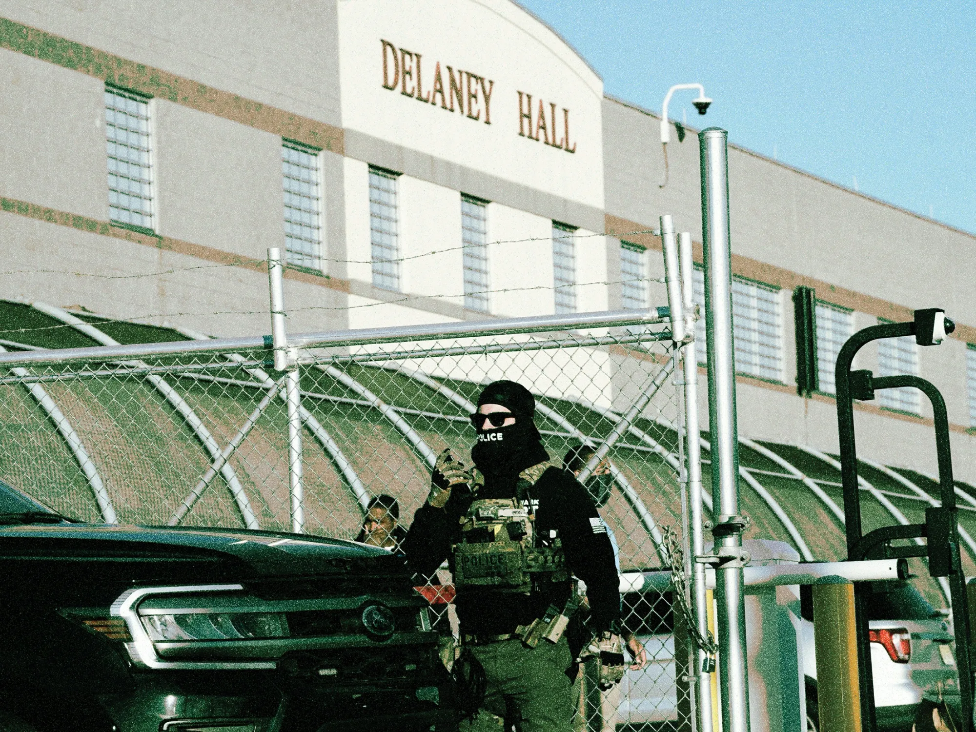 ICE agents monitor a protest outside Delaney Hall, a converted immigrant detention center in New Jersey on May 7.&nbsp;