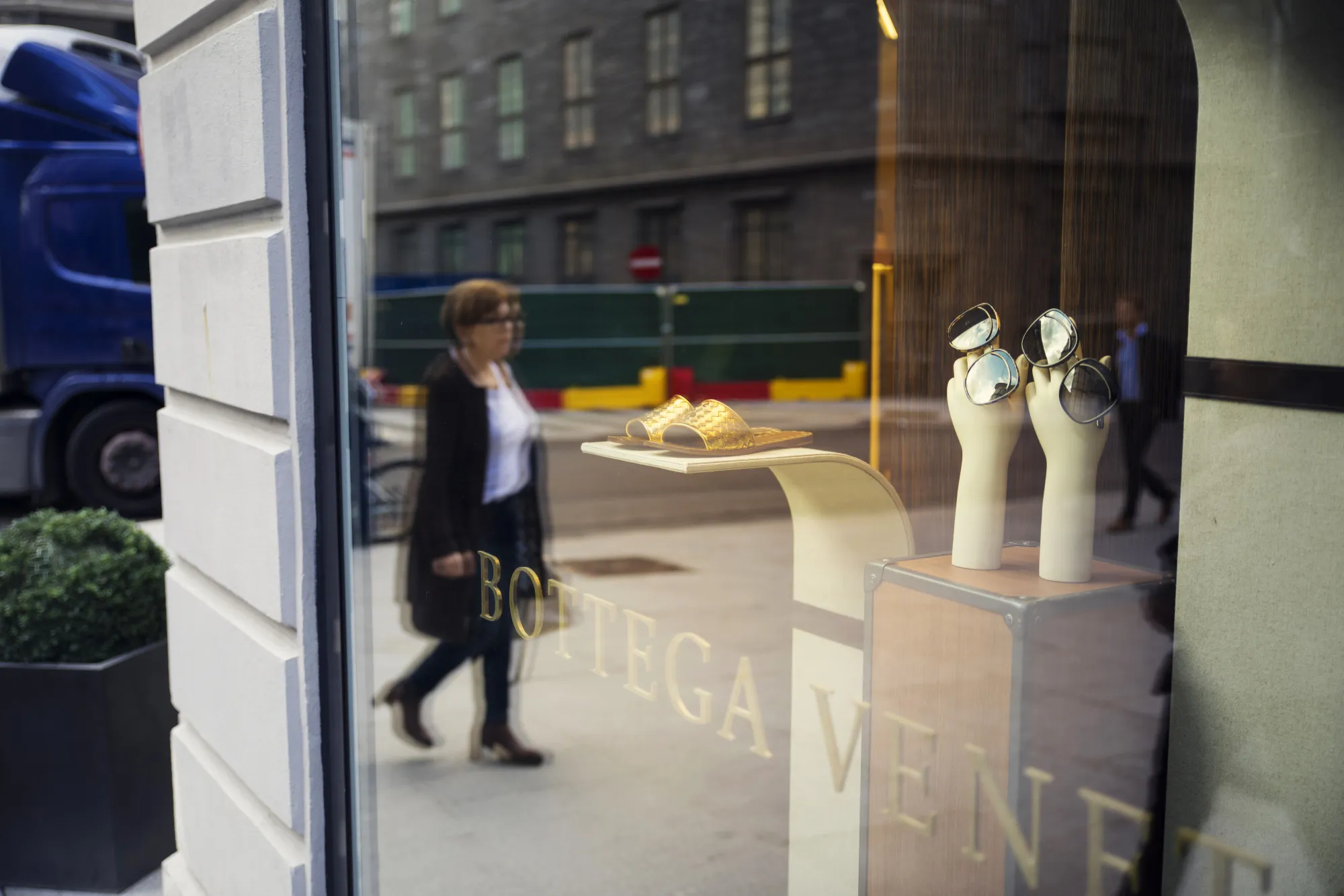 Luxury products sit on display in the window of a Bottega Veneta store in Oslo.