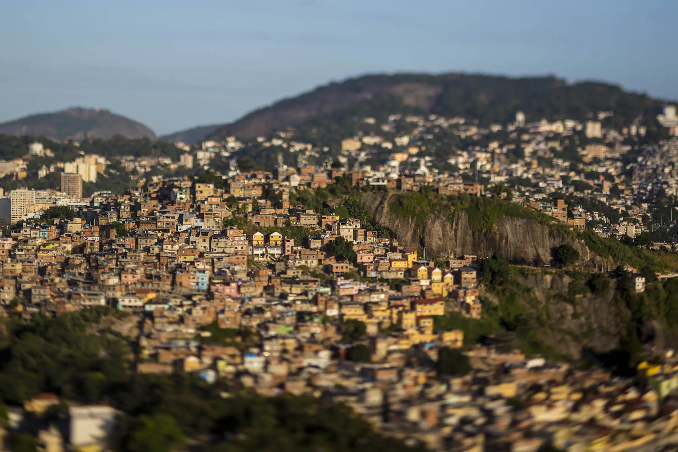 Providencia slum stands in this photo taken with a tilt-shift lens in Rio de Janeiro, Brazil, on Wednesday, May 20, 2015. Even with the real posting the biggest drop among major currencies this year, Brazil's current account gap has hovered near a record as a percentage of gross domestic product.
