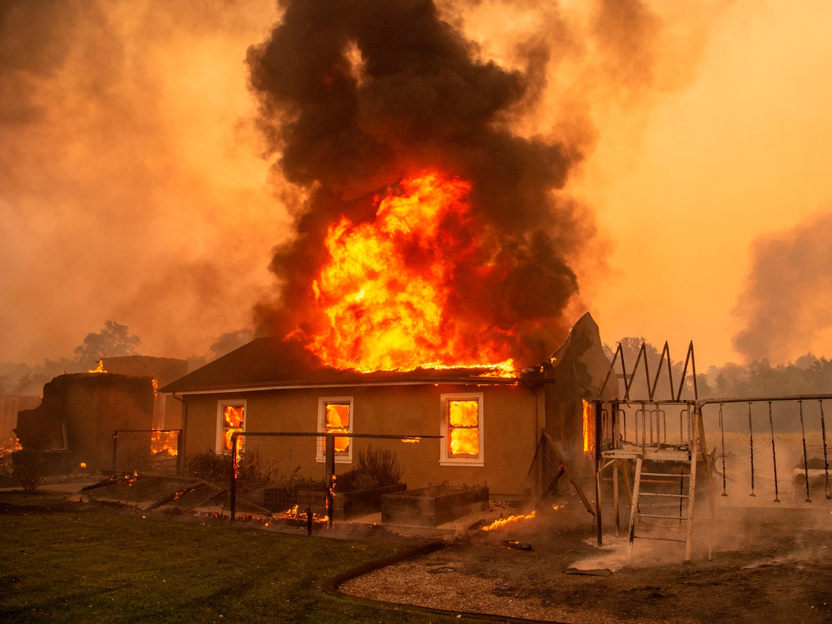 A home burns during the Kincade fire near Geyserville, California, on Oct. 24.