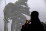 A man live streams as gusts from Hurricane Ian hit&nbsp;Punta Gorda, Fla., on Sept. 28.