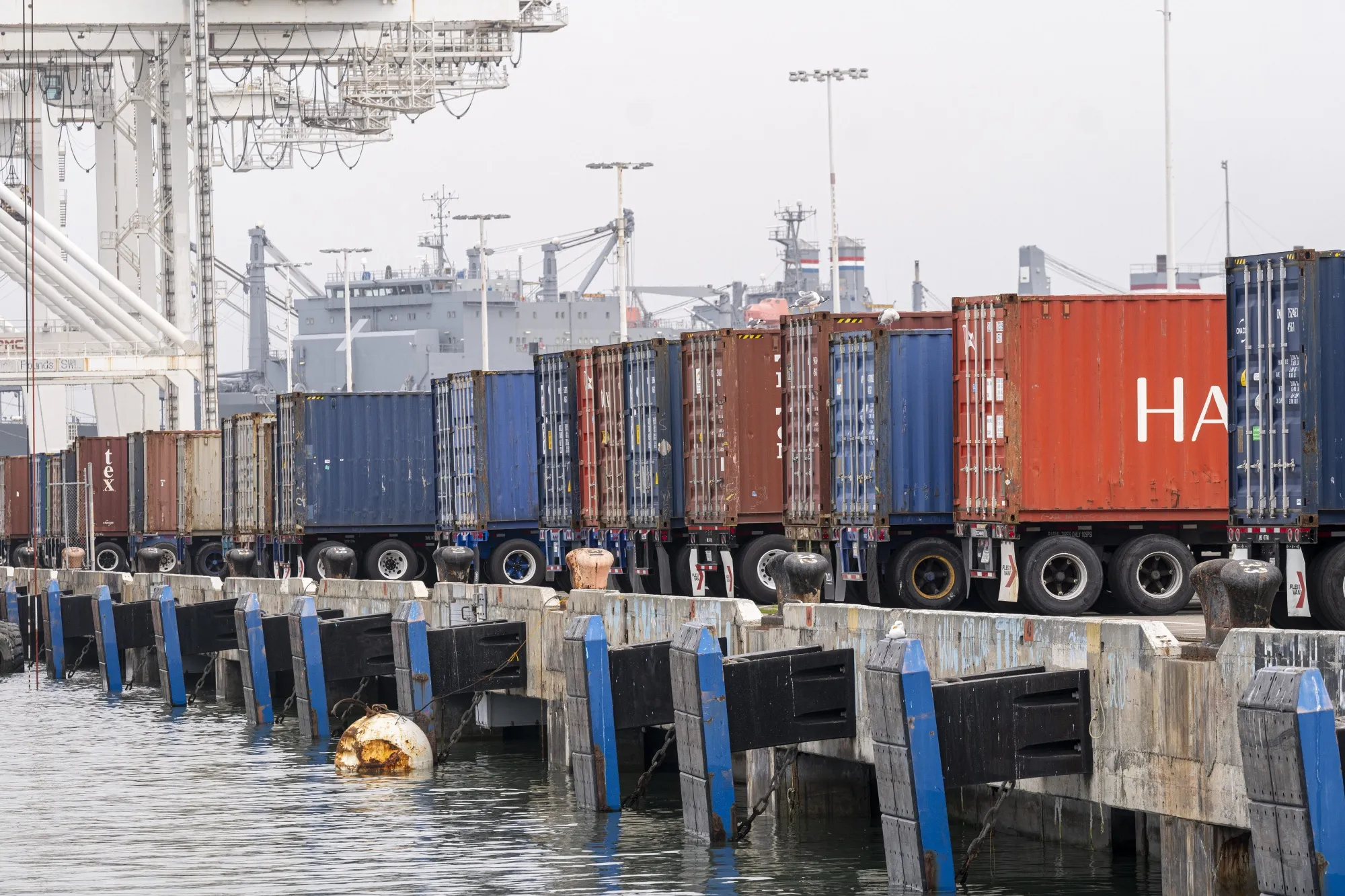 Shipping containers on trucks at the Port of Oakland in California.