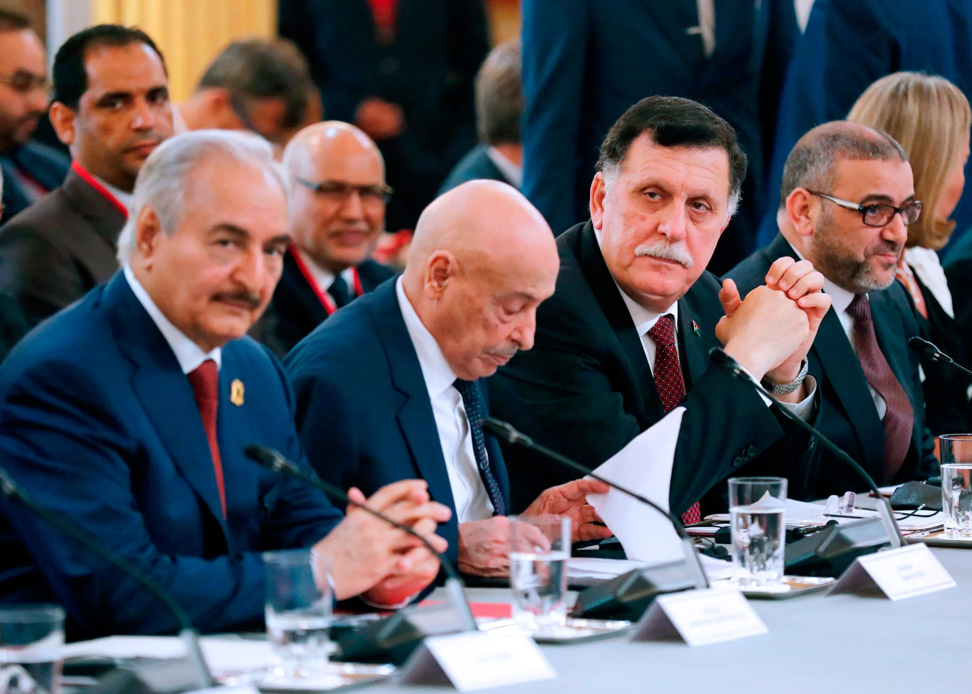 From left,&nbsp;Khalifa Haftar,&nbsp;Aguila Saleh Issa,&nbsp;Fayez al-Sarraj, and Khaled Mechri attend an International Congress on Libya at the Elysee Palace in Paris, on May 29.