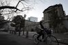 A cyclist passes the Bank of Japan (BOJ) headquarters in Tokyo, Japan, on Tuesday, Jan. 21, 2020. The Bank of Japan took a brighter view of the economy and left its main policy settings unchanged Tuesday, offering a further indication that it is unlikely to add to its stimulus.