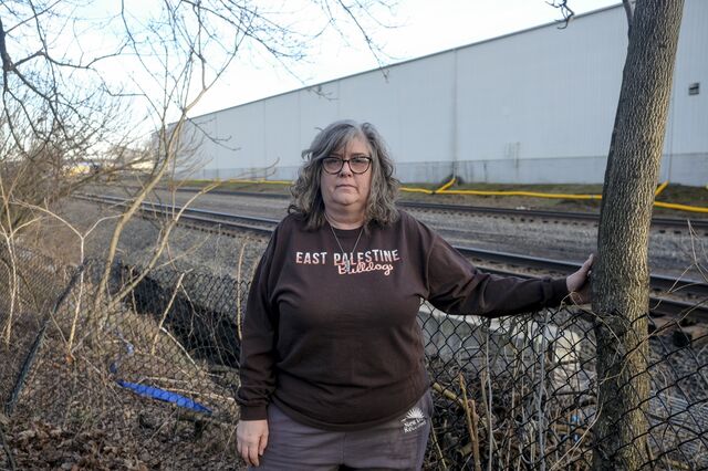 Brenda Foster near railroad tracks. 