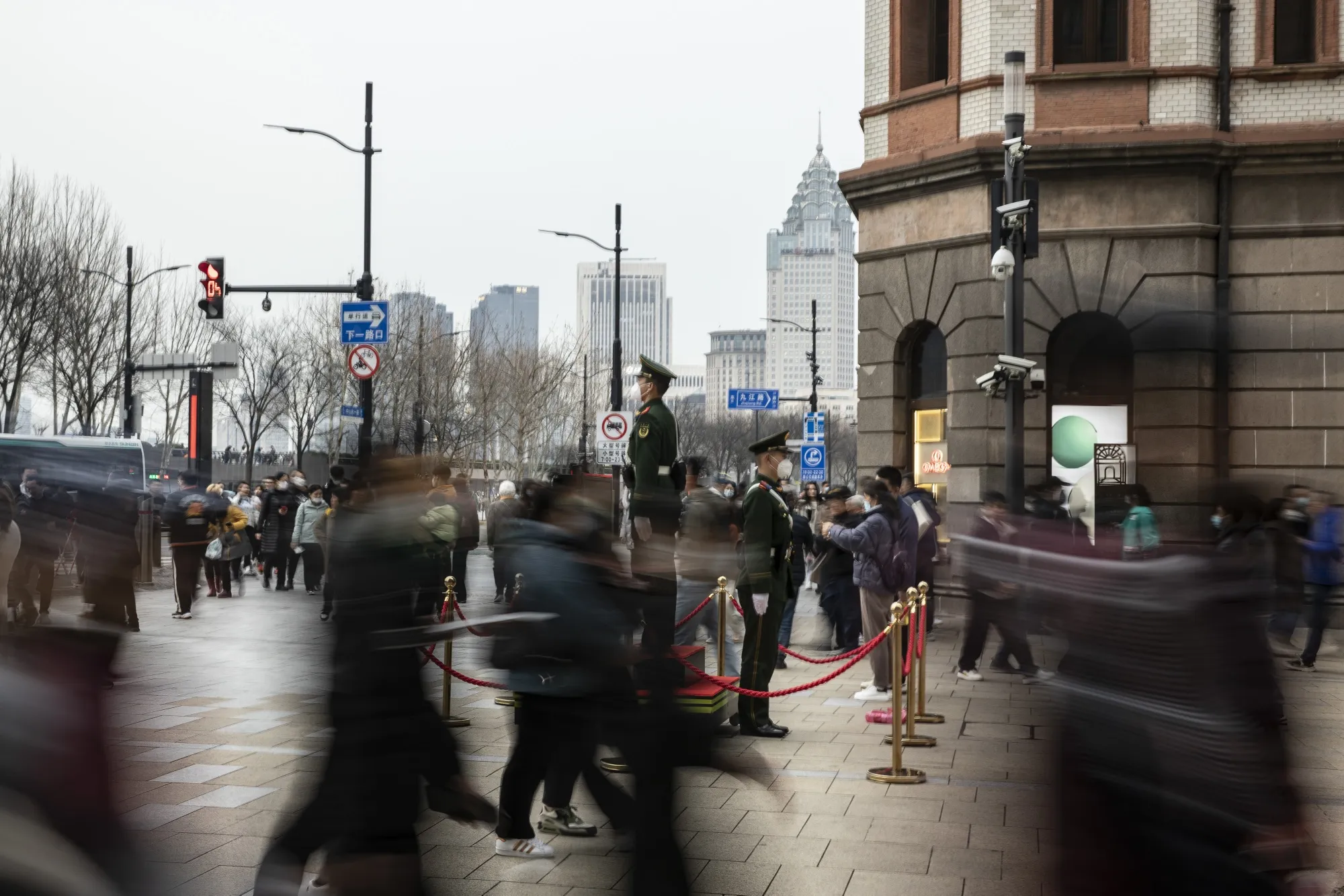 Members of the People's Armed Police stand guard near the Bund in Shanghai, China.