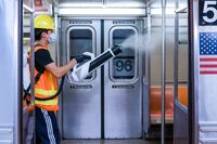 An MTA contractor disinfects a subway train at the 96th Street-2nd Avenue station in New York, on June 10.