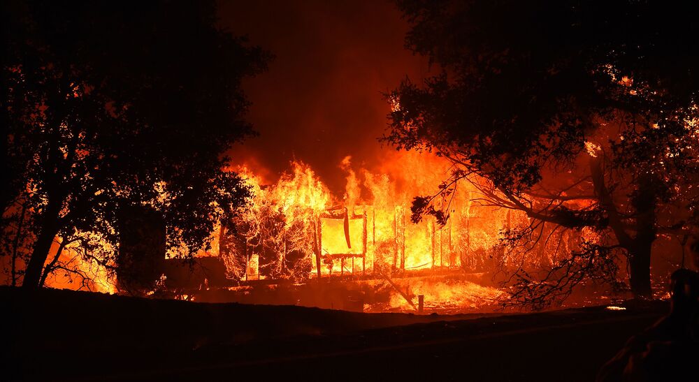 A home burns during the Kincade fire near Geyserville, California on Oct. 24.