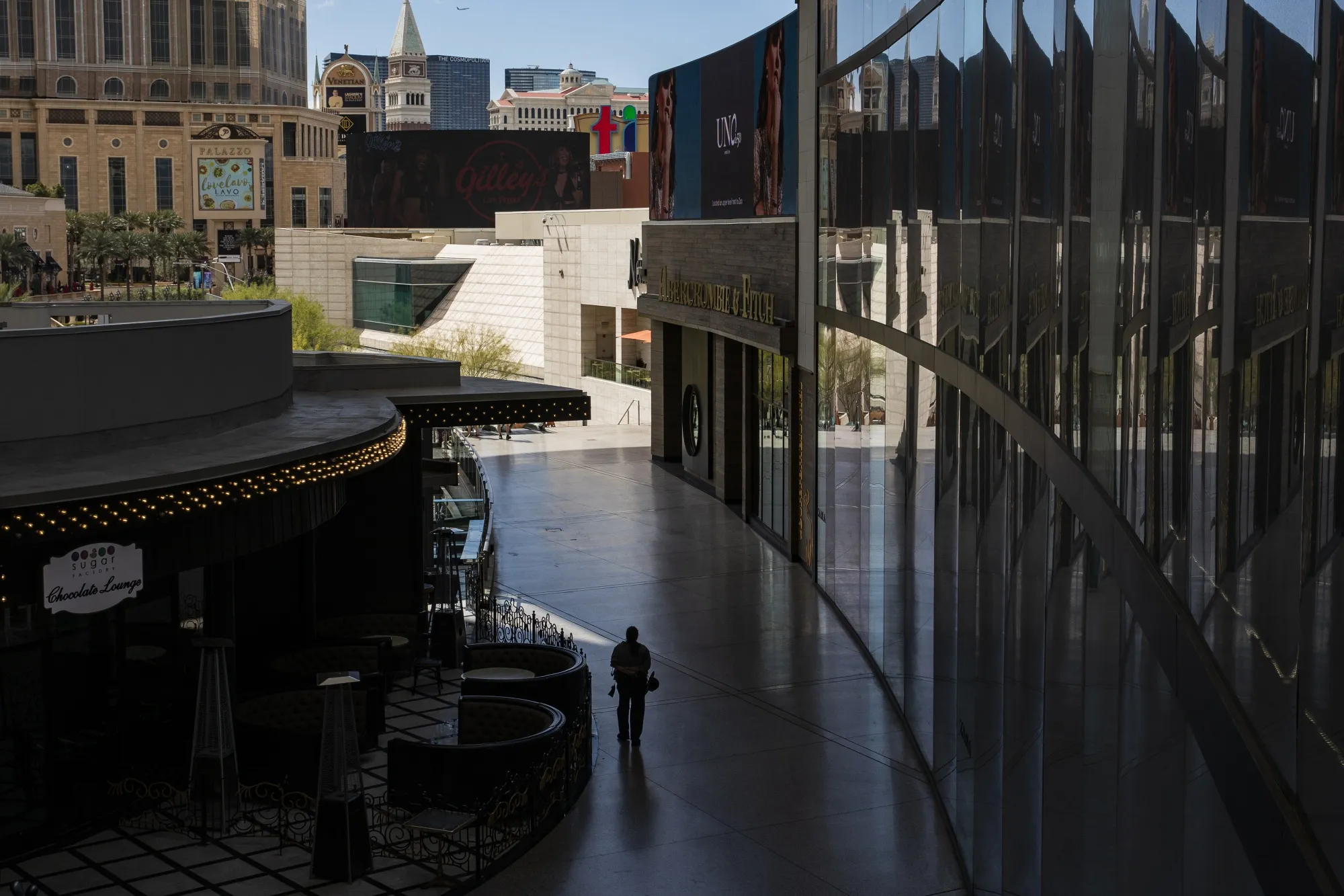 A pedestrian walks through the Fashion Show Mall on the Las Vegas Strip.