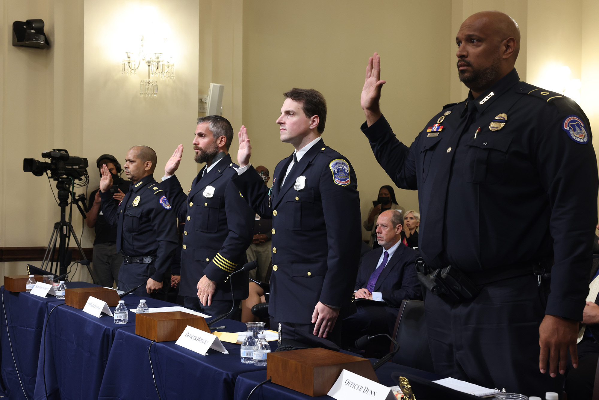 Sgt. Aquilino Gonell of the US Capitol Police, Officer Michael Fanone of the DC Metropolitan Police, Officer Daniel Hodges of the DC Metropolitan Police and Private First Class Harry Dunn of the US Capitol Police are sworn in to testify before the House Select Committee investigating the January 6 attack on the U.S. Capitol.