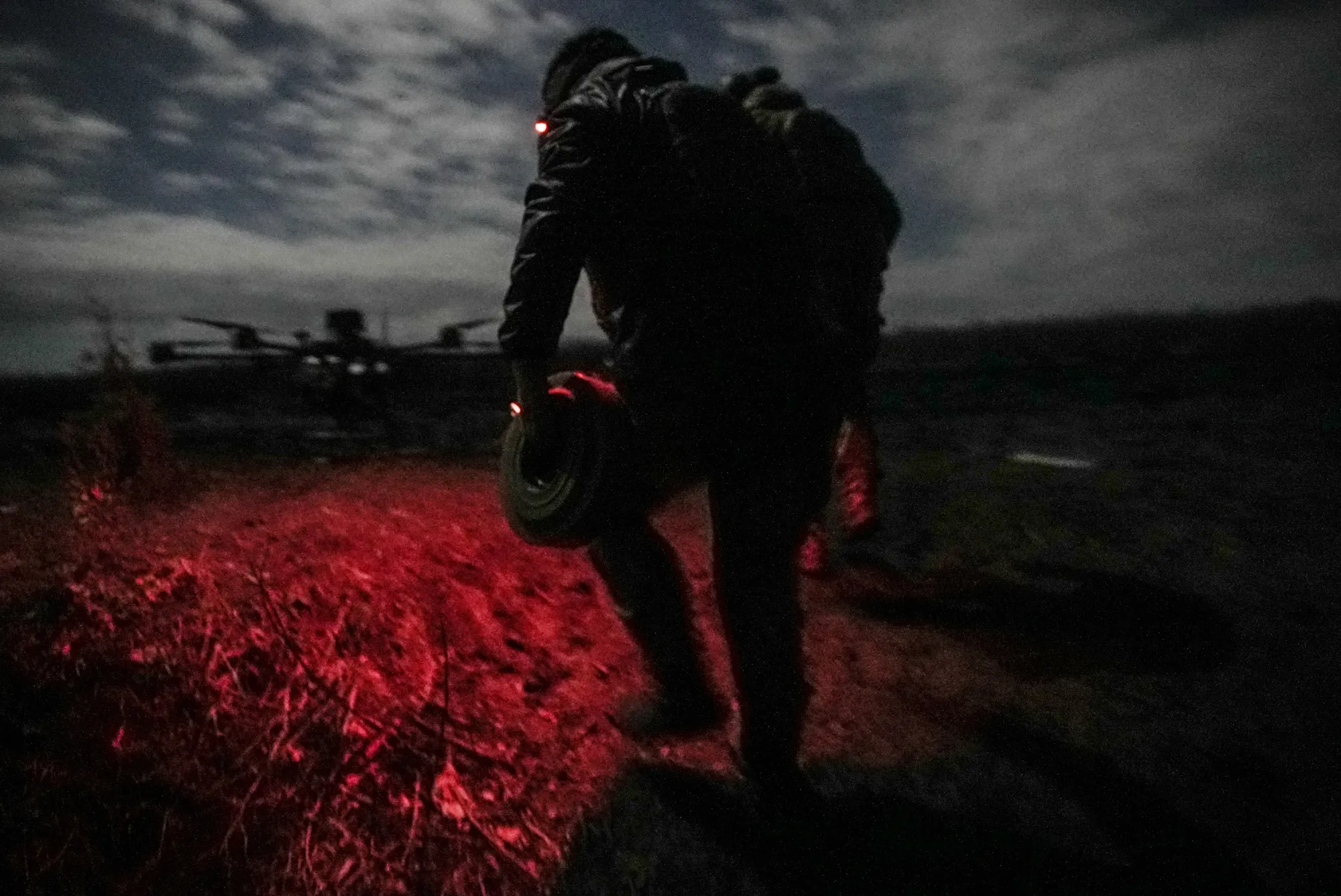 Fixing the drop on a&nbsp;Vampire drone during a night mission with the Code 9.2&nbsp;unit&nbsp;at the front line near&nbsp;Bakhmut, Donetsk region, Ukraine, on&nbsp;Oct. 28.