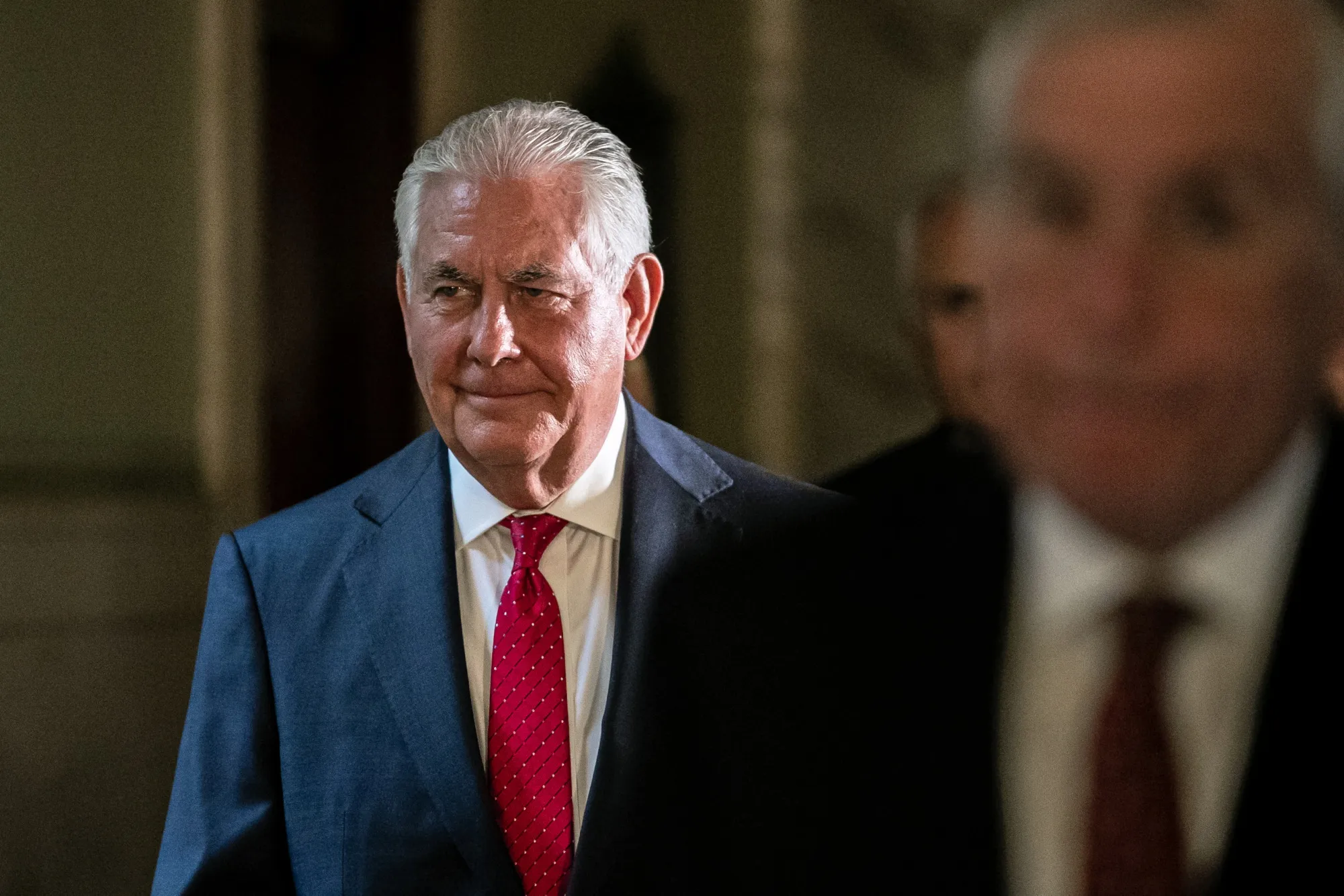 Rex Tillerson departs from state court in New York on Oct. 30.