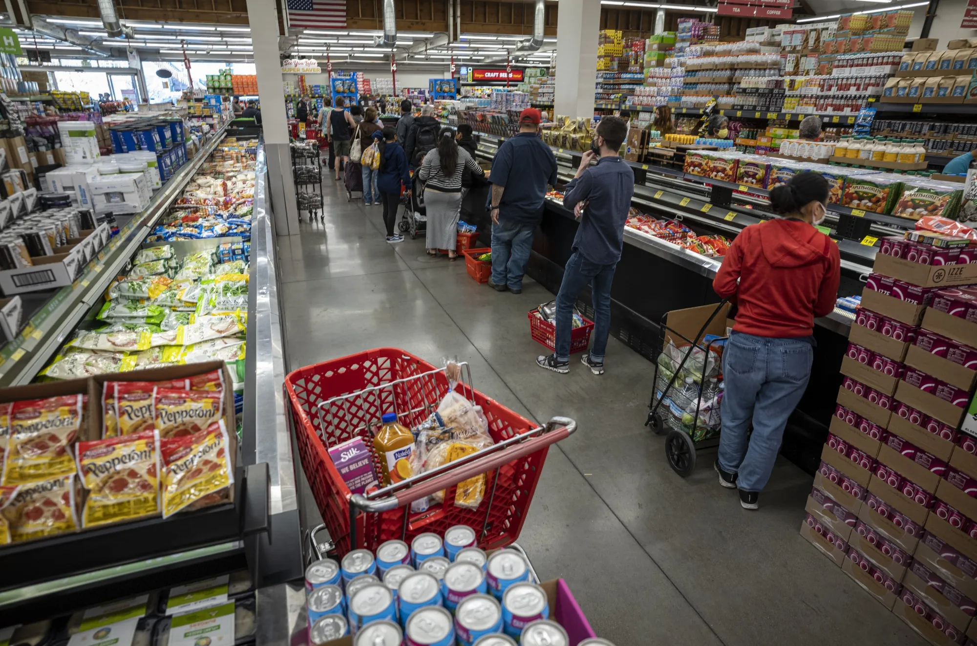 Customers in line to check out at a grocery store in San Francisco, California, U.S.