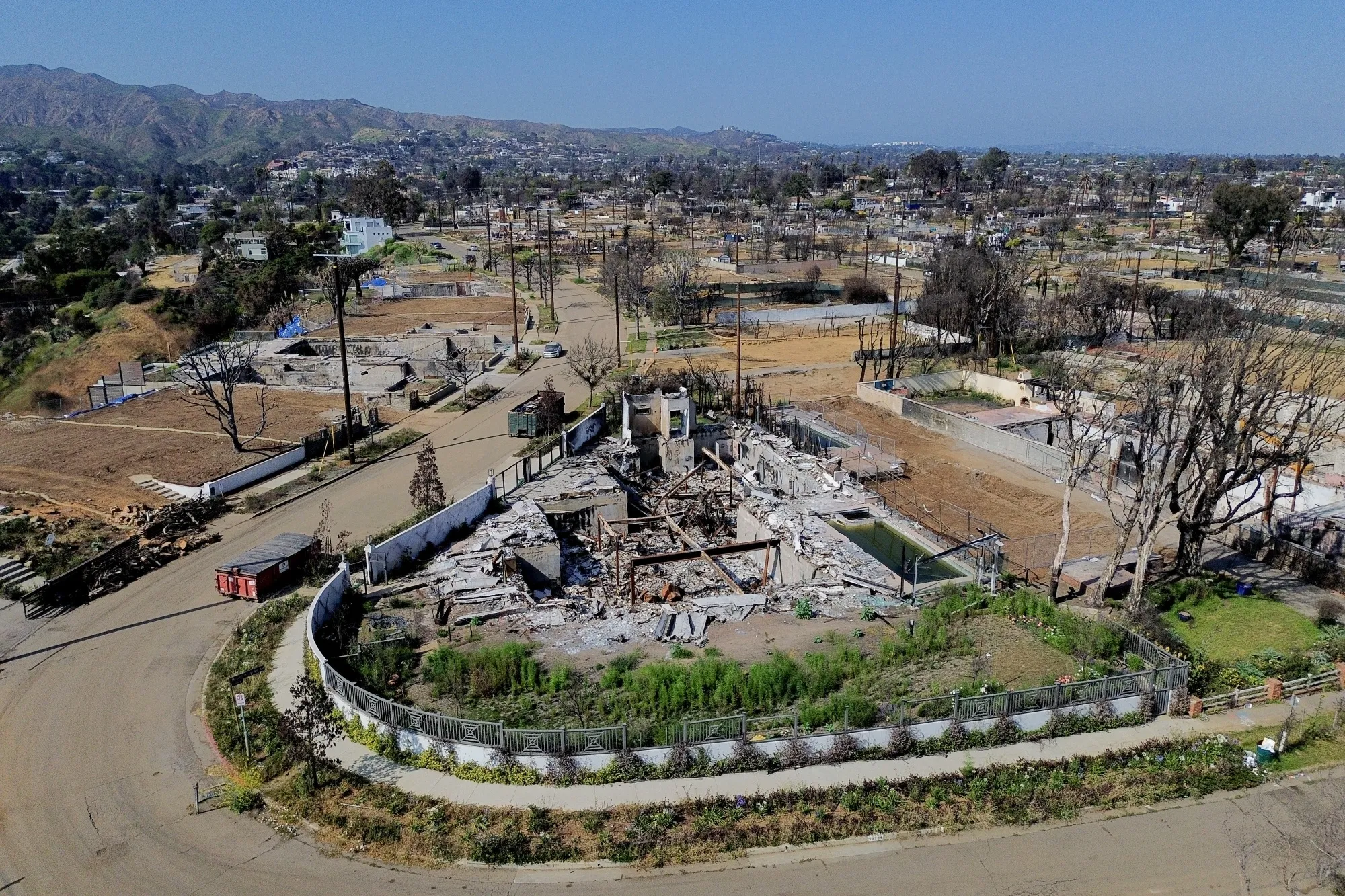 Cleared lots and destroyed homes in the Pacific Palisades neighborhood of Los Angeles.
