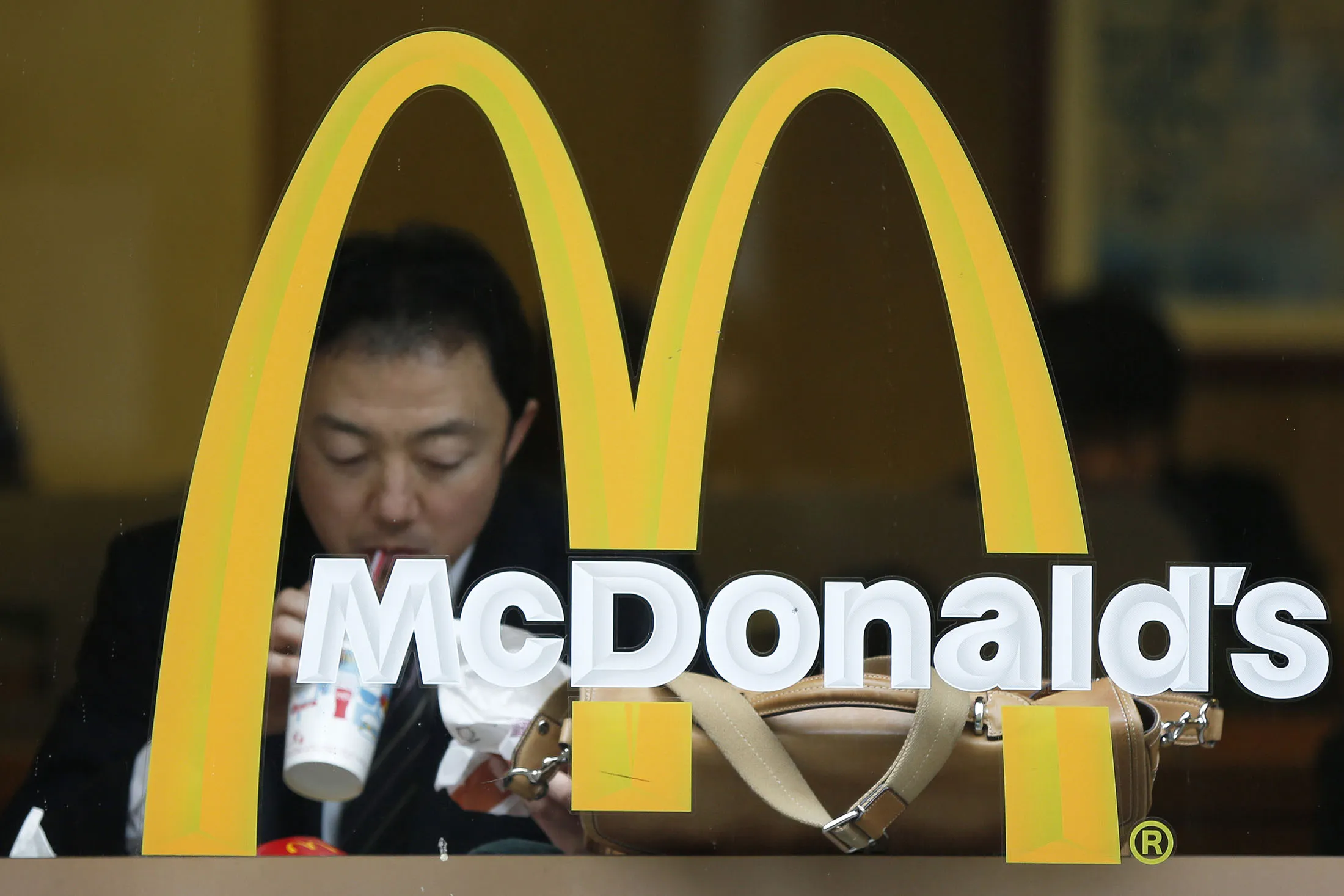 A customer dines at a McDonald's restaurant in Tokyo. The stock plunged as much as 7.9 percent in Tokyo trading, the sharpest intraday drop since March 2011.
