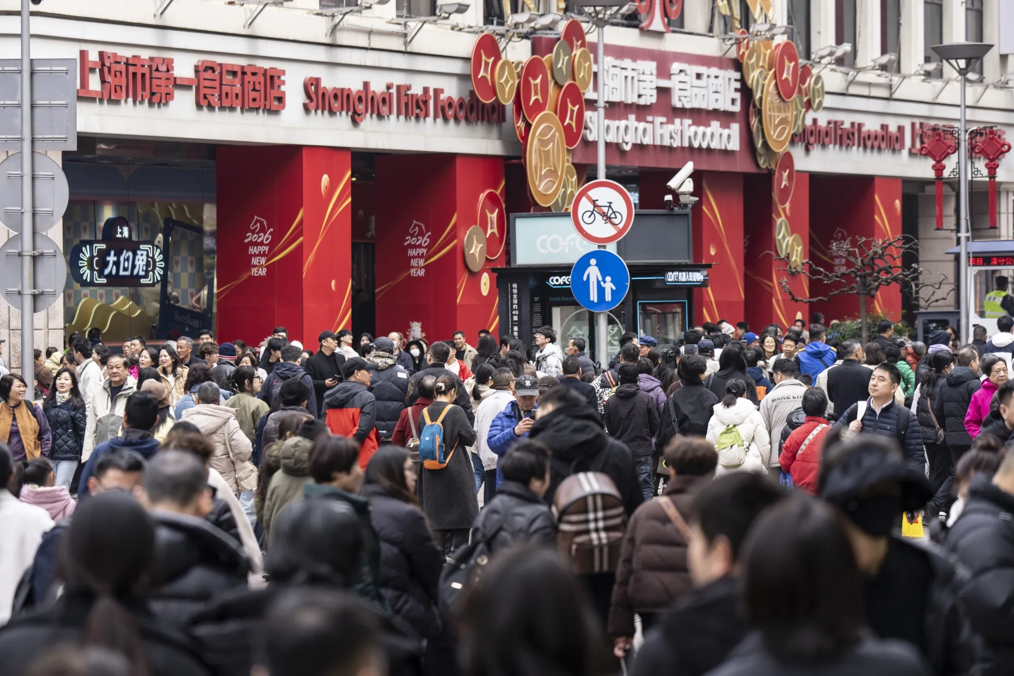Crowds in the Nanjing East Road shopping area in Shanghai last week.
