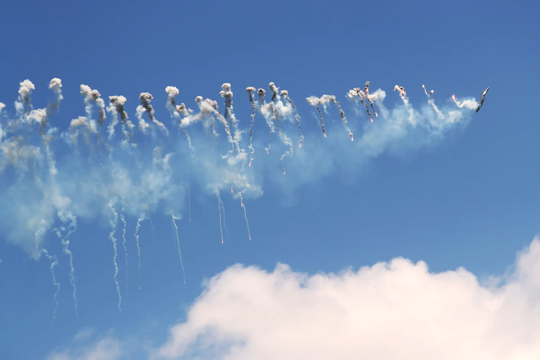 The A Royal Malaysian Air Force Sukhoi SU-30 MKM jet performs maneuvers at the Changi Exhibition Centre in Singapore, on Tuesday, Feb. 6, 2018. The air show runs through Feb. 11.