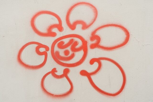 Coronavirus particle as a flower, Autumn Avenue at Fulton Street, Brooklyn
