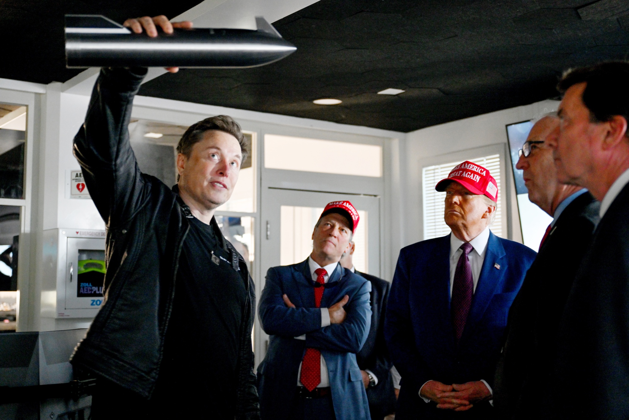 Elon Musk gives a tour to U.S. President-elect Donald Trump and lawmakers of the control room before the launch of the sixth test flight of the SpaceX Starship rocket on November 19, 2024 in Brownsville, Texas. SpaceX’s billionaire owner, Elon Musk, a Trump confidante, has been tapped to lead the new Department of Government Efficiency alongside former presidential candidate Vivek Ramaswamy. Source: Brandon Bell/Getty Images/Getty Images