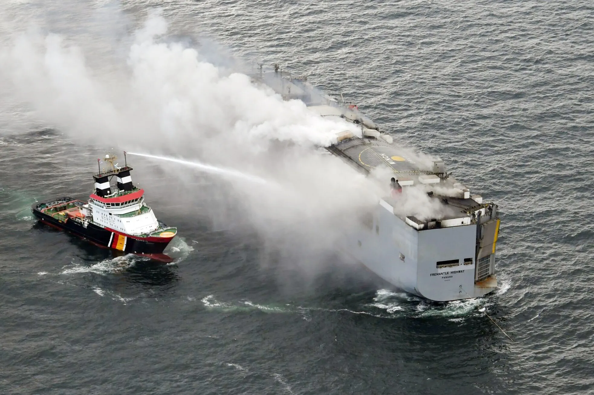 Emergency services tackle the blaze.