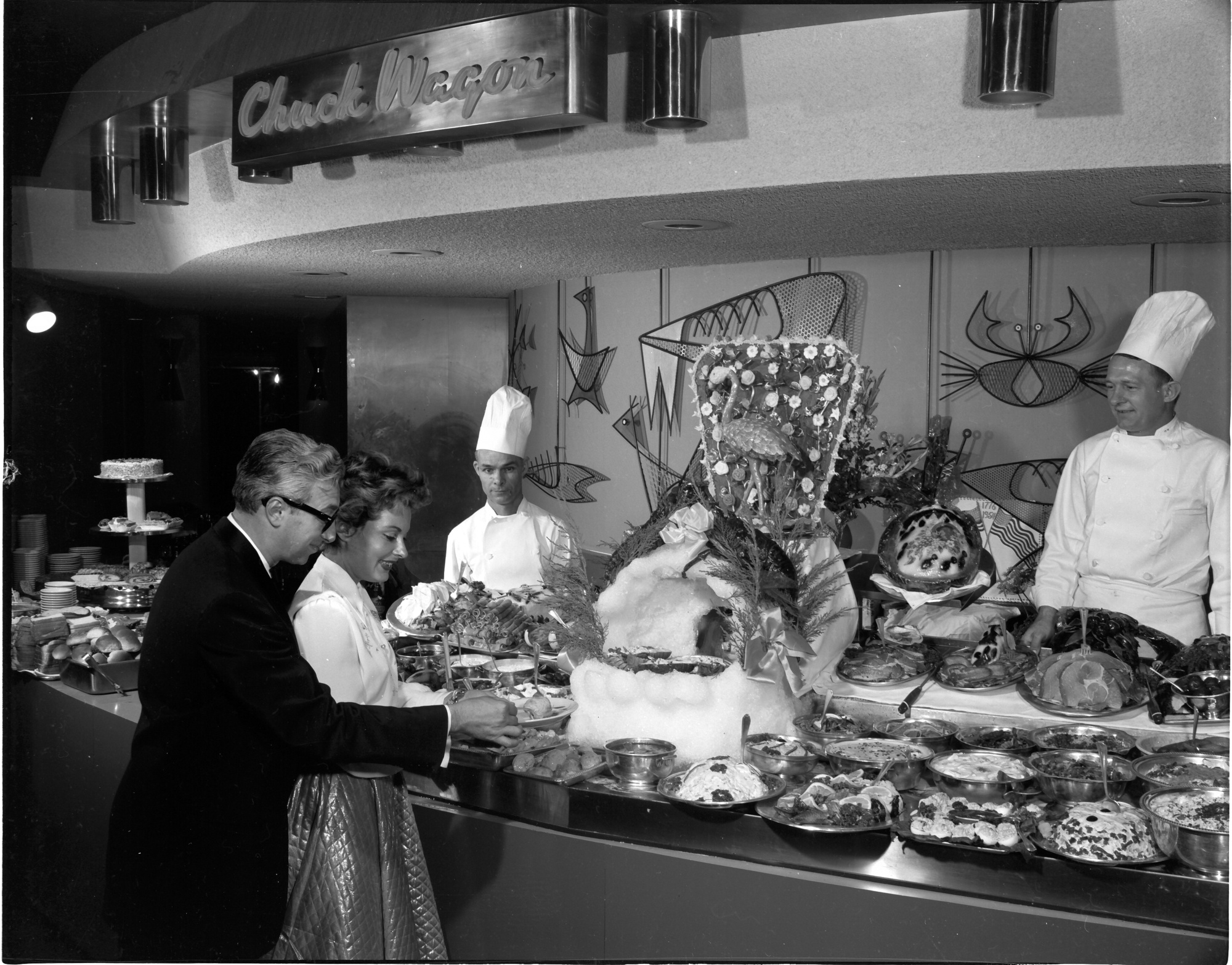 Guests visit the buffet line at the Flamingo in 1954. Photograph: Las Vegas News Bureau