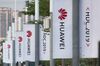 Banners with the Huawei logo are seen outside the venue where the telecom giant unveiled its new HarmonyOS operating system in Dongguan, Guangdong province on August 9, 2019. - Chinese telecom giant Huawei unveiled its own operating system on August 9, as it faces the threat of losing access to Android systems amid escalating US-China trade tensions. (Photo by FRED DUFOUR / AFP) (Photo credit should read FRED DUFOUR/AFP/Getty Images)