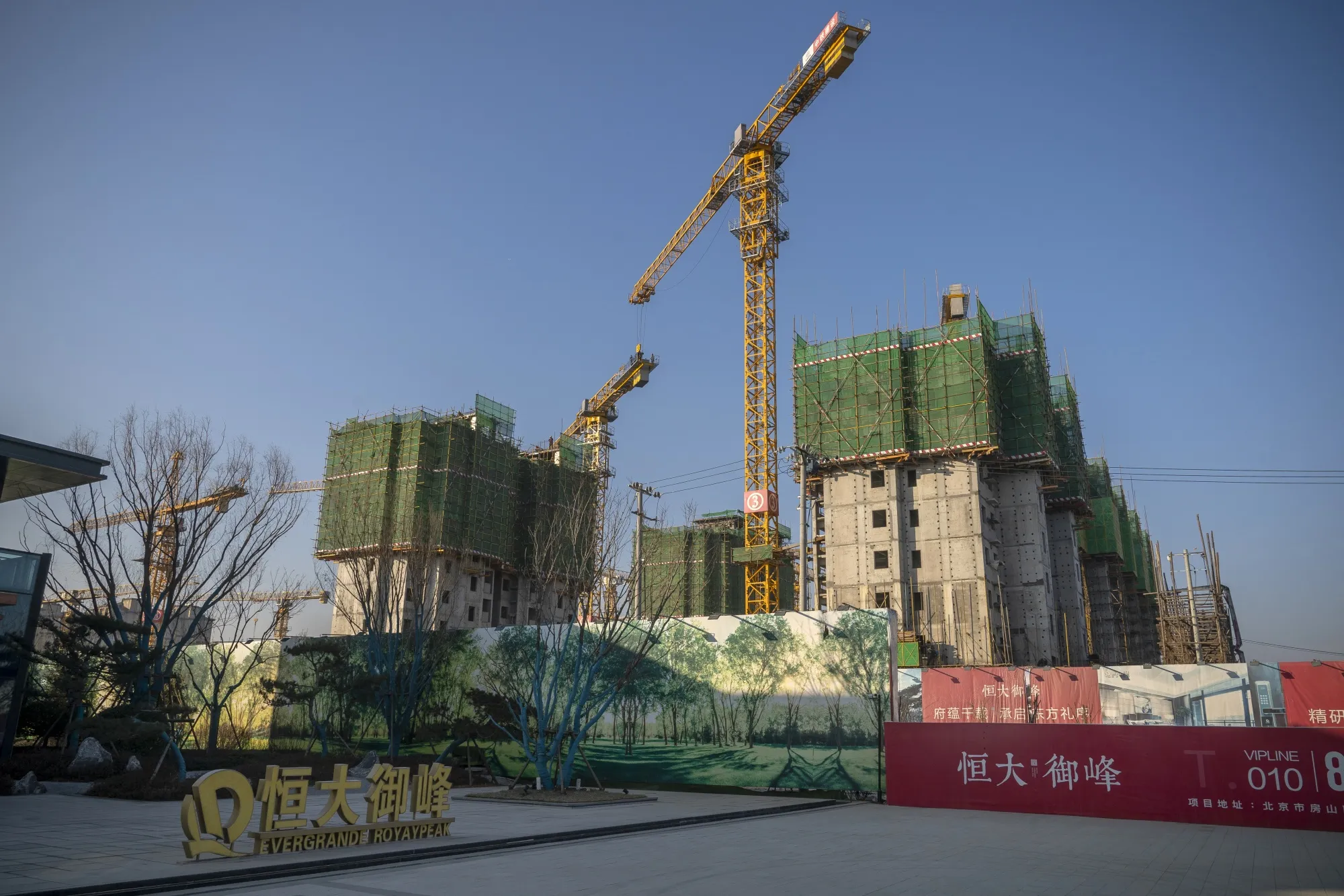 Unfinished apartment buildings at the construction site of a China Evergrande Group development in Beijing, China.