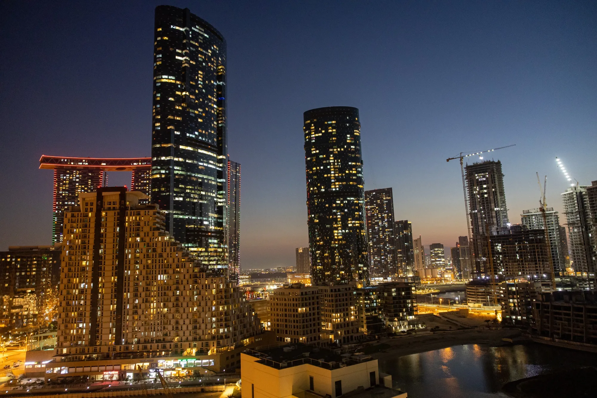 Residential high-rise buildings at night in the Al Reem district of Abu Dhabi