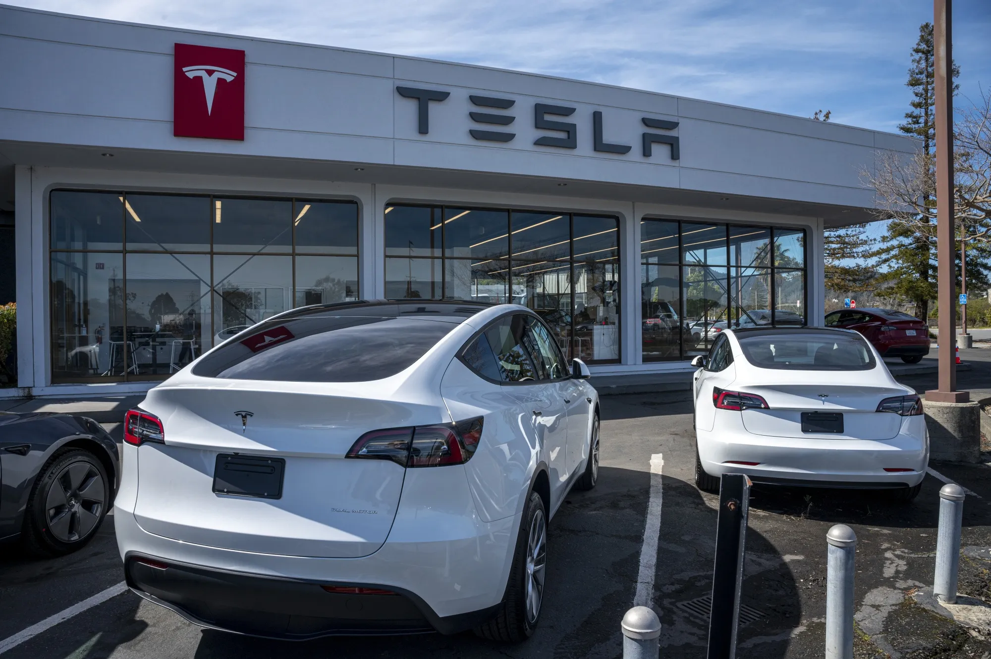 Vehicles for sale at a Tesla store in Corte Madera, California.