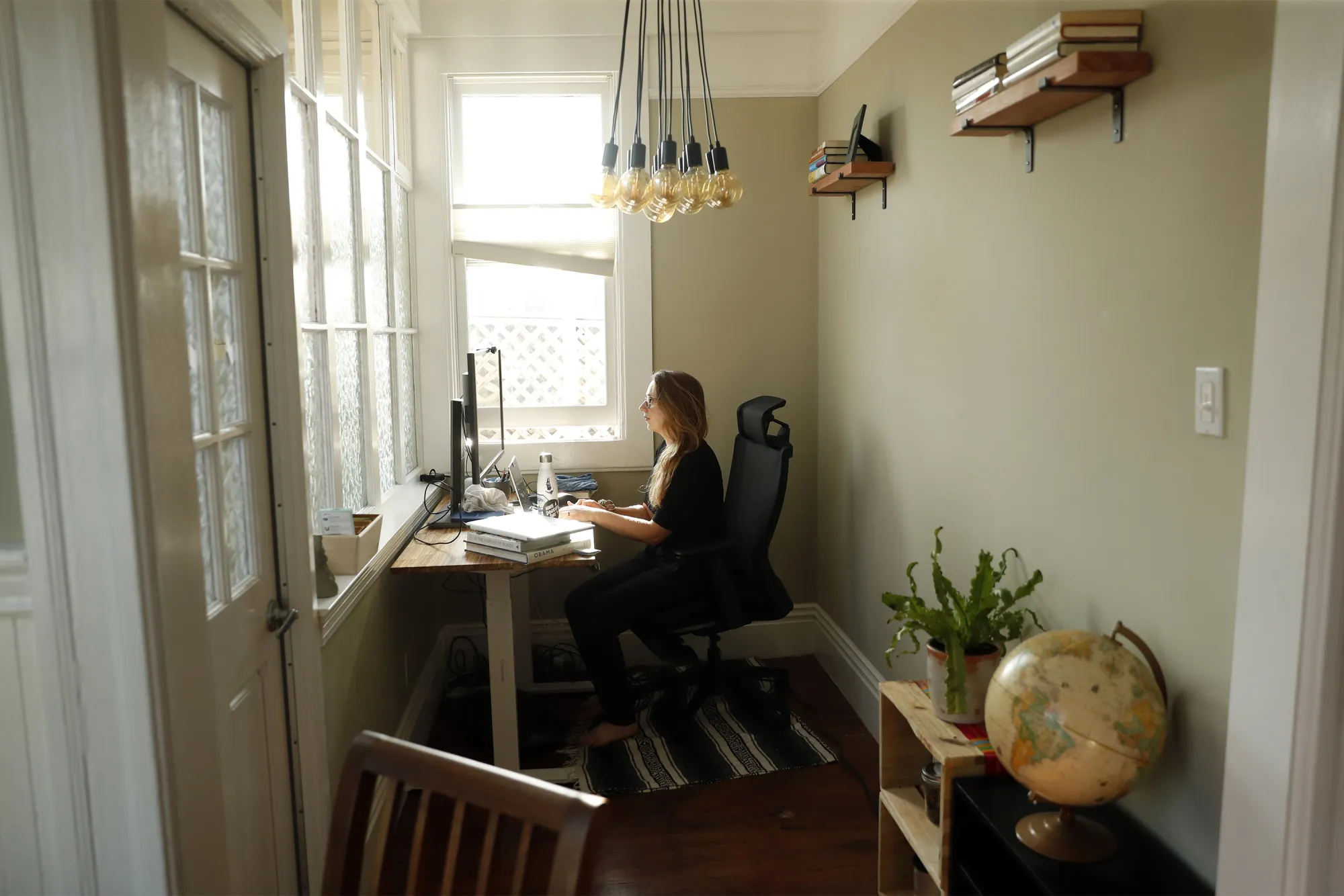Ally Sillins works at her home in San Francisco. The Bay Area’s&nbsp;Metropolitan Transportation Commission proposed a remote-work goal that would require office-based employers to have 60% of their workers telecommute.&nbsp;