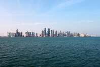 Qatar Bars FAB From Adding Clients Amid Riyal Manipulation Probe