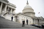Security during a news conference outside the US Capitol in Washington, DC, US, on Tuesday, Sept. 30, 2025. The US is hurtling toward a government shutdown, with Democrats and Republicans seemingly no closer to agreeing on a plan to fund federal operations and both sides blaming each other for the stalemate.