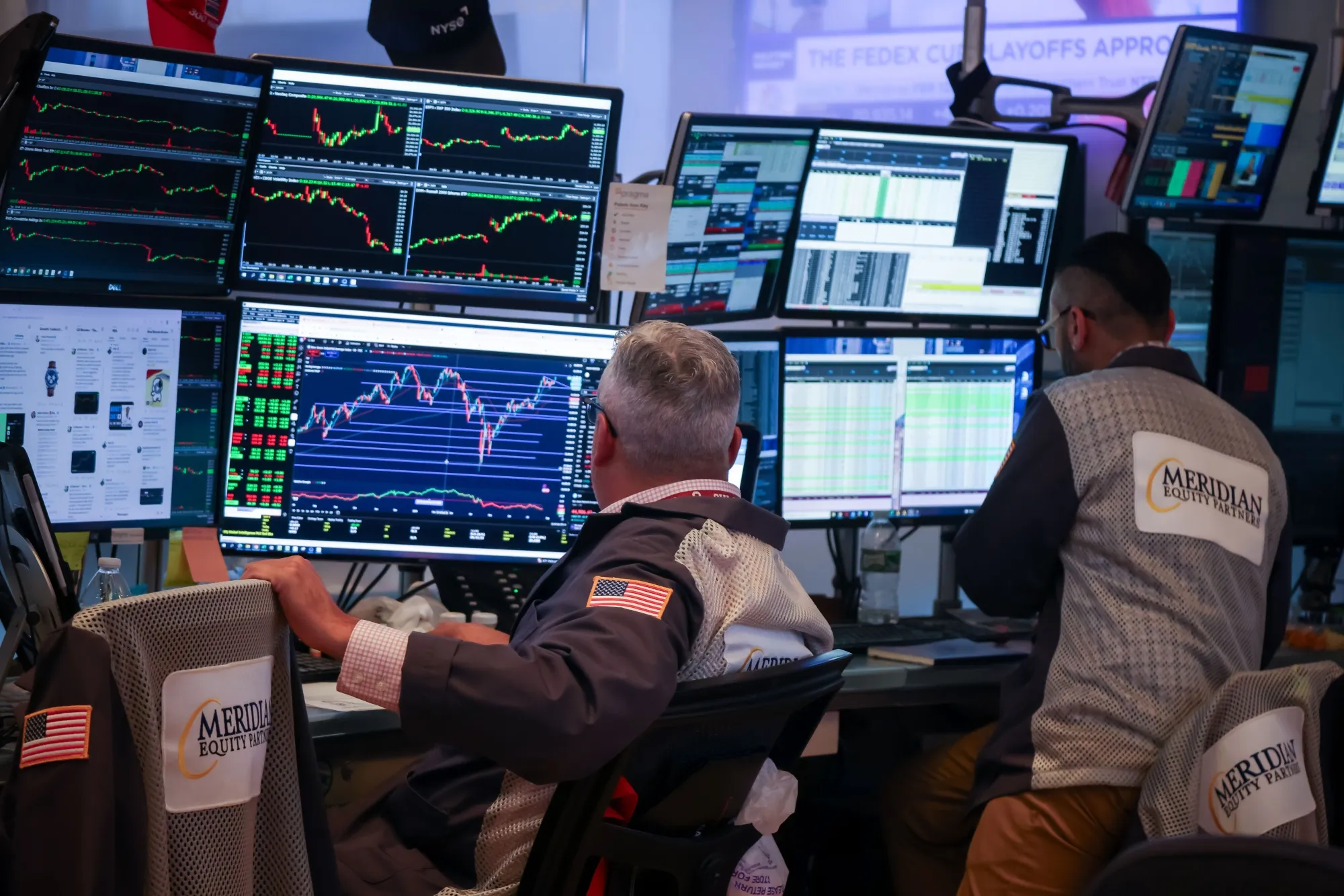 Traders work on the floor of the New York Stock Exchange.