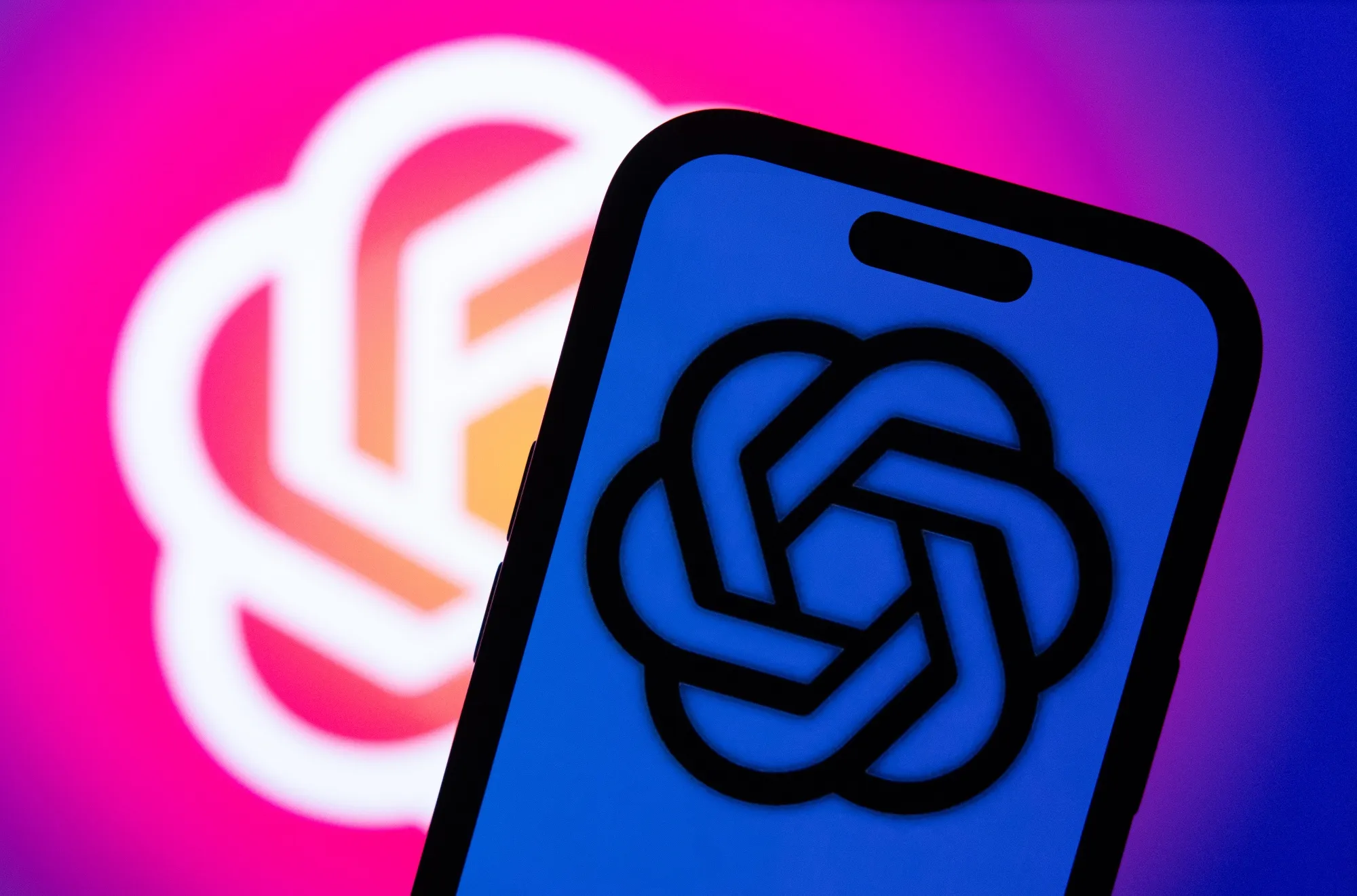 The ChatGPT virtual assistant logo on a smartphone.