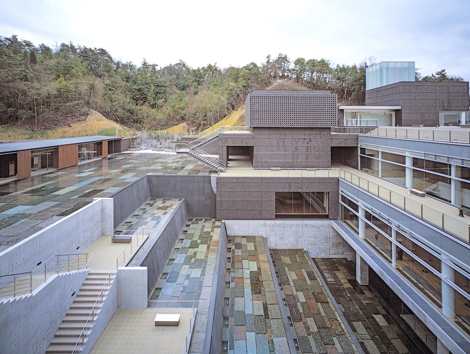 The terraced museum of Ceramic Park Mino (2002) in Gifu, Japan, includes gallery spaces, conference rooms, tea houses, and a public workshop. Situated in a valley, it defers to the surrounding landscape and serves as an extension of the topography.