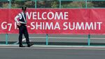 A police officer stands guard front of the G7 Ise-shima summit banner on May 5. The G7 summit will be held in Ise-Shima, Mie prefecture on May 26 and 27.
