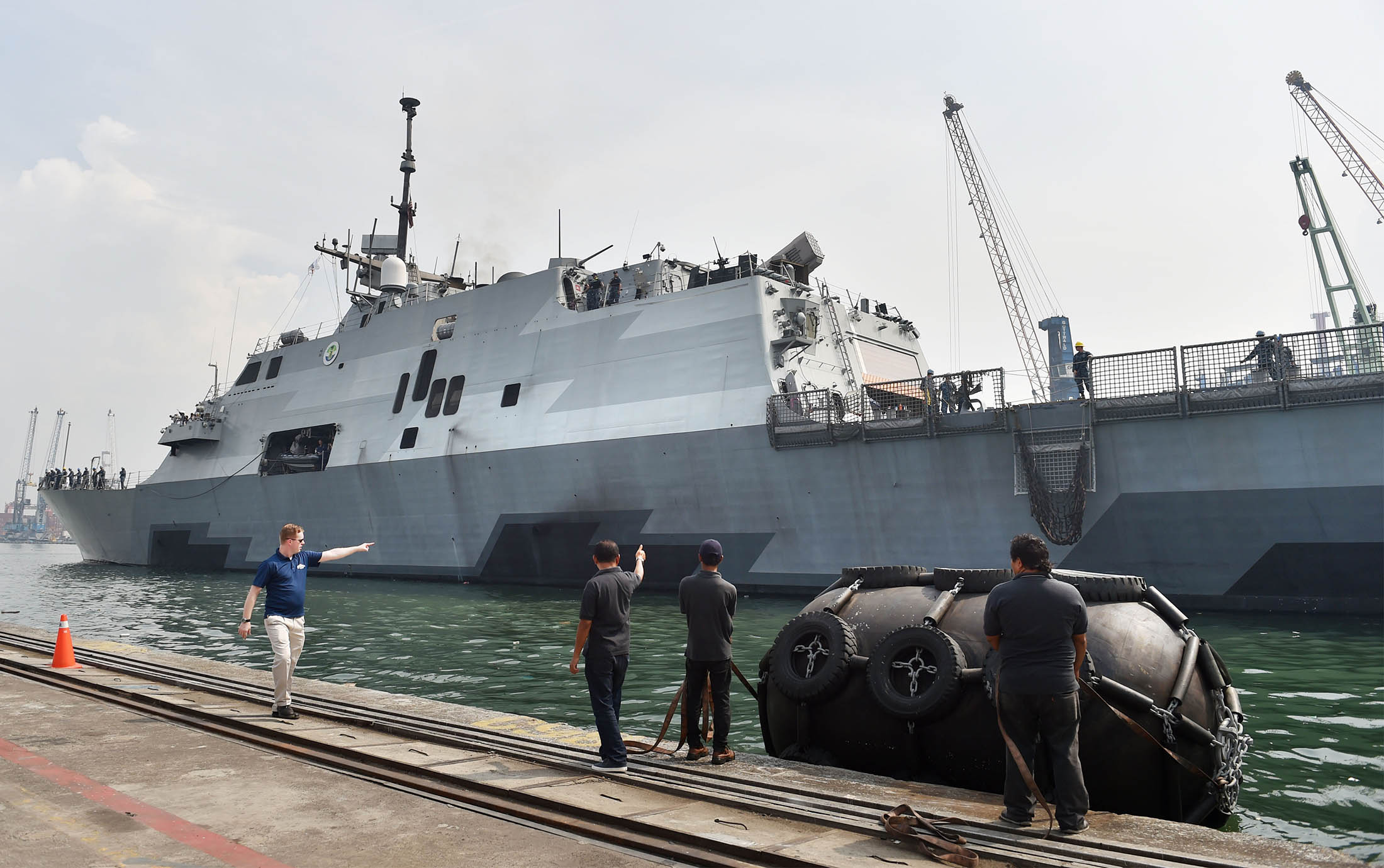 USS Fort Worth is docked in Jakarta's Tanjung Priok port in 2014. The USS Fort Worth built by Lockheed Martin Corp. had damage to combining gears that let the ship run on a mix of diesel and gas turbine engines.
