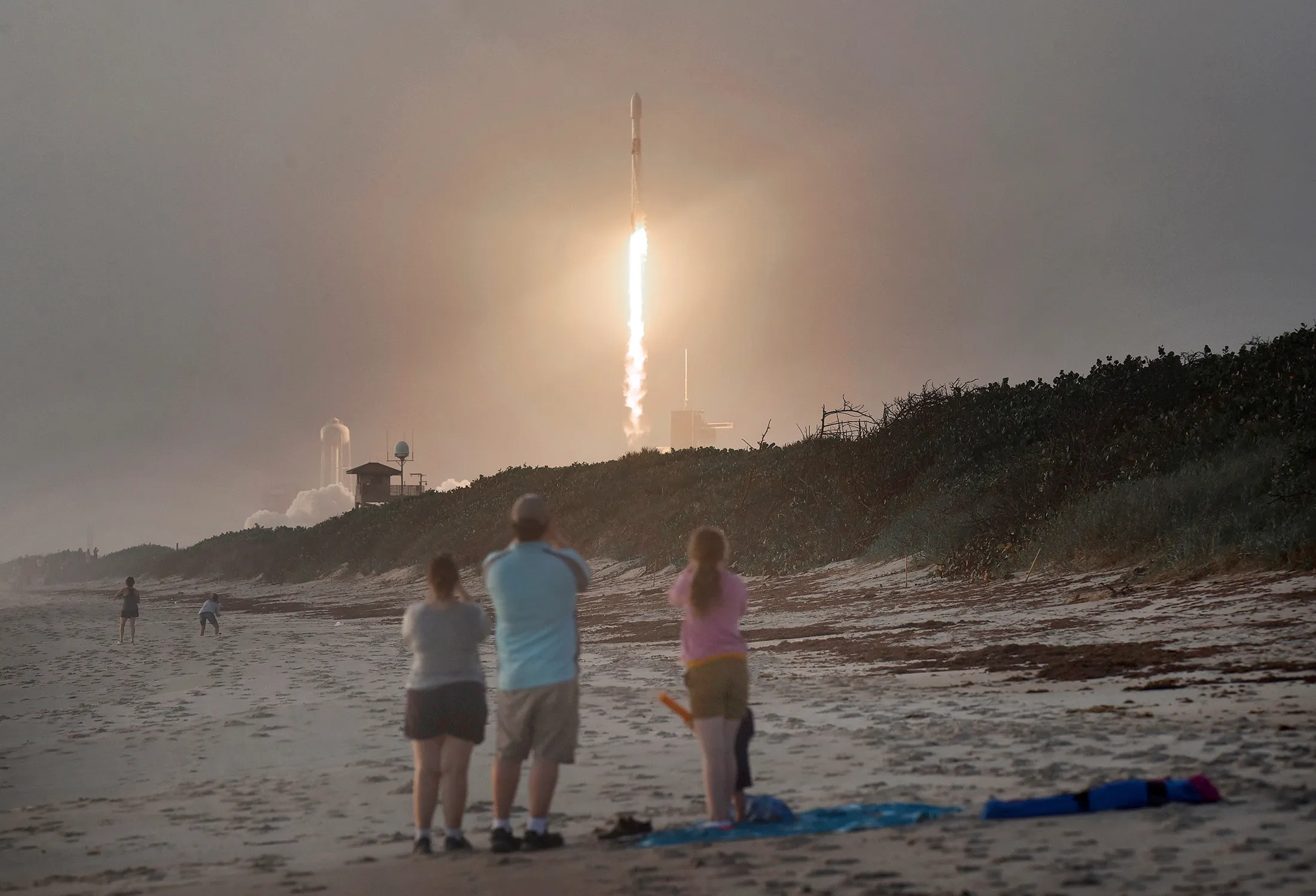 SpaceX Falcon 9 rocket carrying 60 Starlink satellites launches from pad 39A at the Kennedy Space Center in Cape Canaveral, Florida, on Oct. 6, 2020.