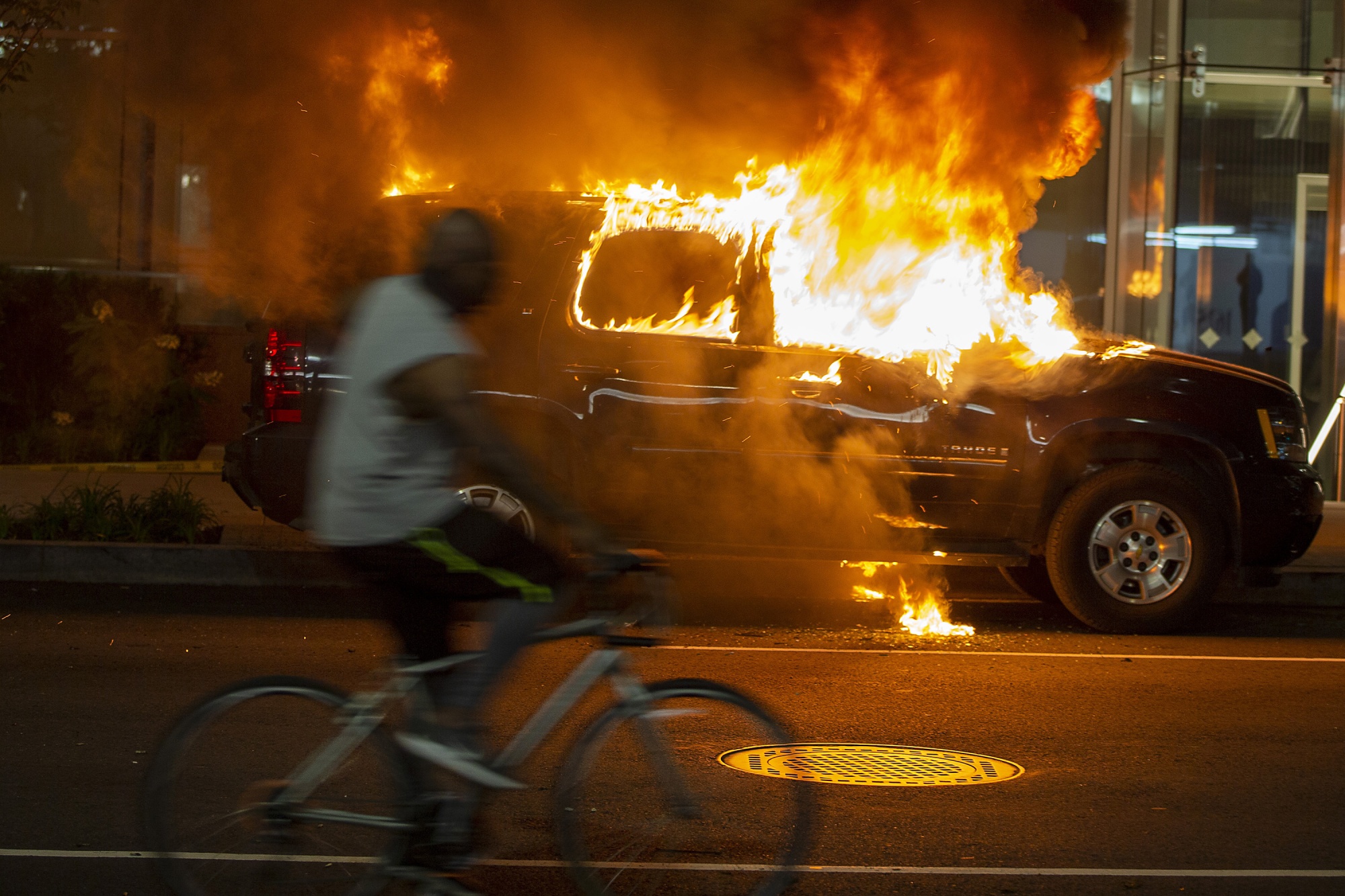 A burning car&nbsp;near Lafayette Square Park in Washington, D.C., on May 30.