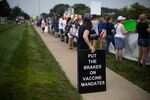 Demonstrators gather during a protest against mandatory Covid-19 vaccinations for healthcare workers in&nbsp; Livonia, Michigan.&nbsp;
