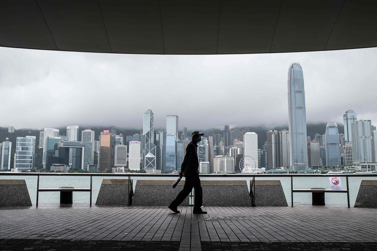 Hong Kong Calls On Finance Firms To Bring Workers Back - Bloomberg