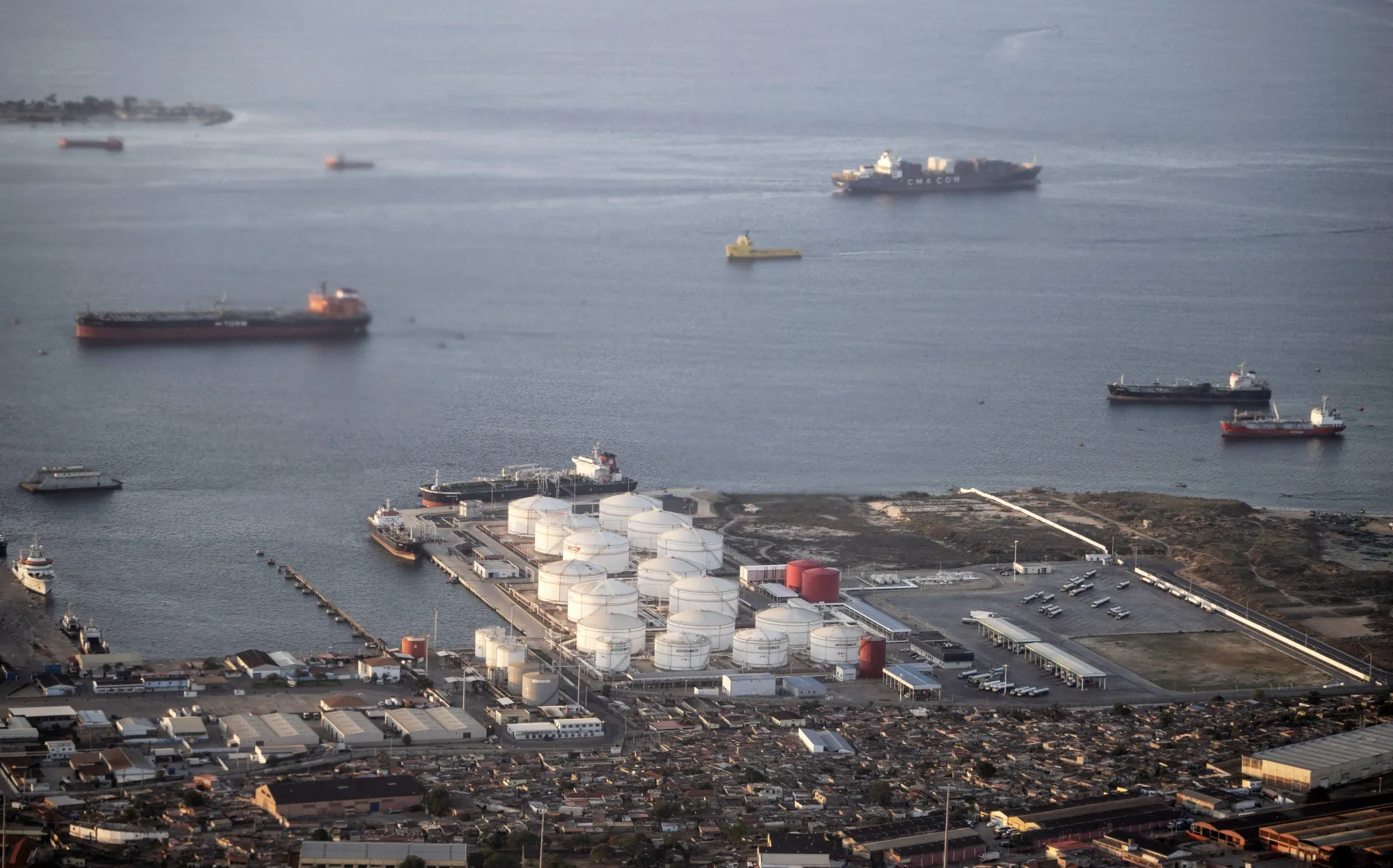An oil and gas storage facility at a port in Luanda.
