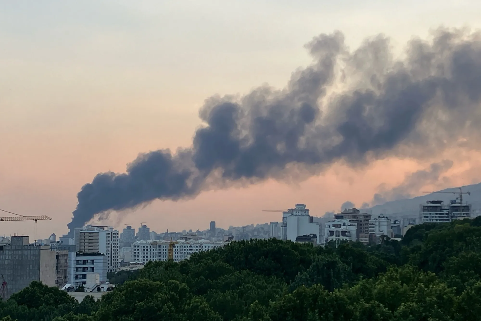 Smoke billows from an explosion at the Islamic Republic of Iran Broadcasting (IRIB) building in Tehran. Photographer: AFP via Getty Images