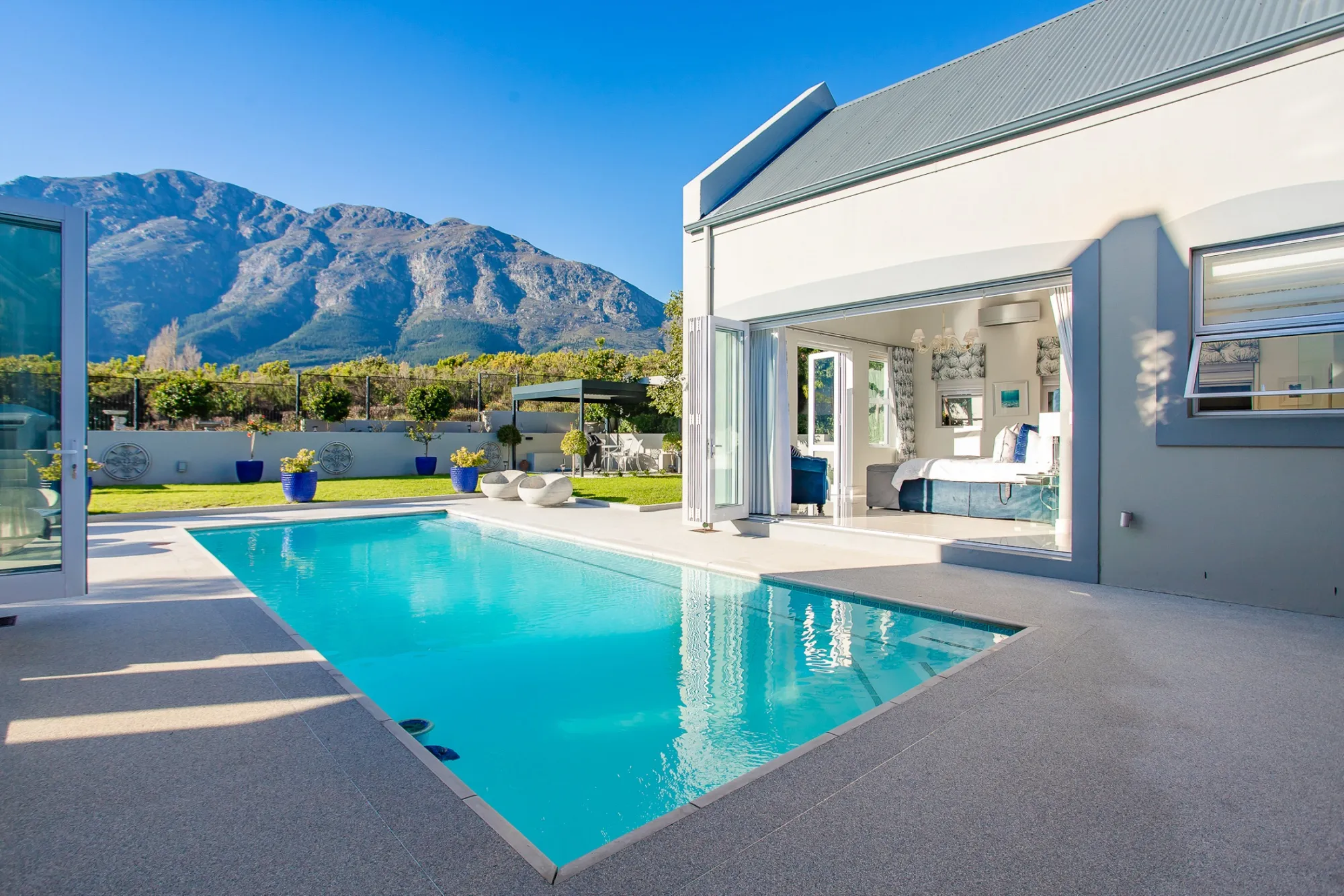 A house in the Fransche Hoek Eco Estate in&nbsp;South Africa&nbsp;runs partially on solar power&nbsp;and is equipped with an EV charging station.
