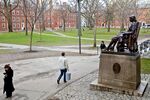 A statue of John Harvard sits in Harvard Yard on the school's campus in Cambridge, Massachusetts