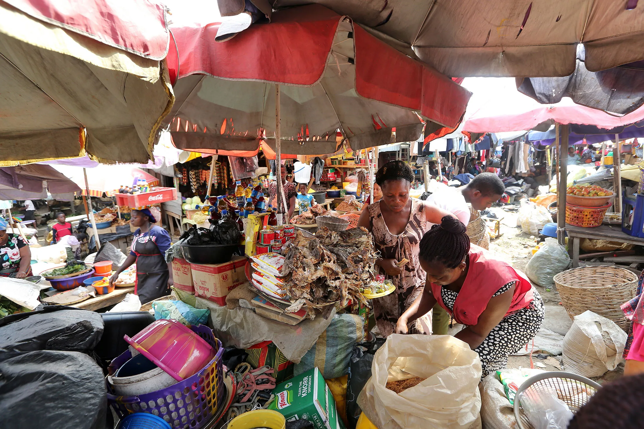 Market stall vendors in Yenagoa, Nigeria.
