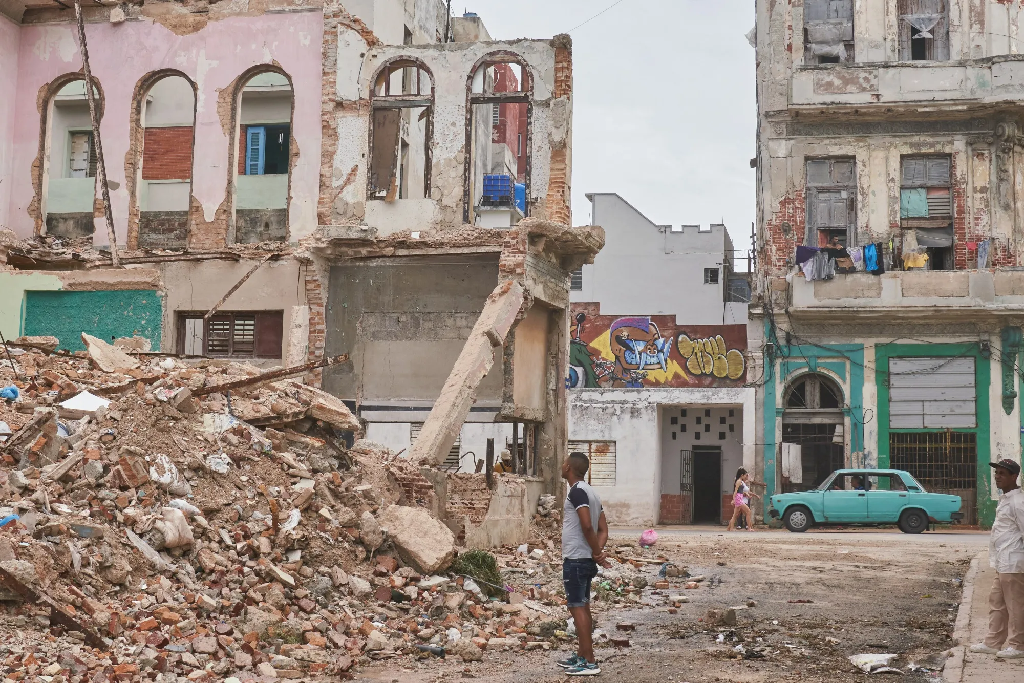 A resident views a building with severe structural damage following Hurricane Ian in Havana, Cuba, on&nbsp;Sept. 28, 2022.&nbsp;