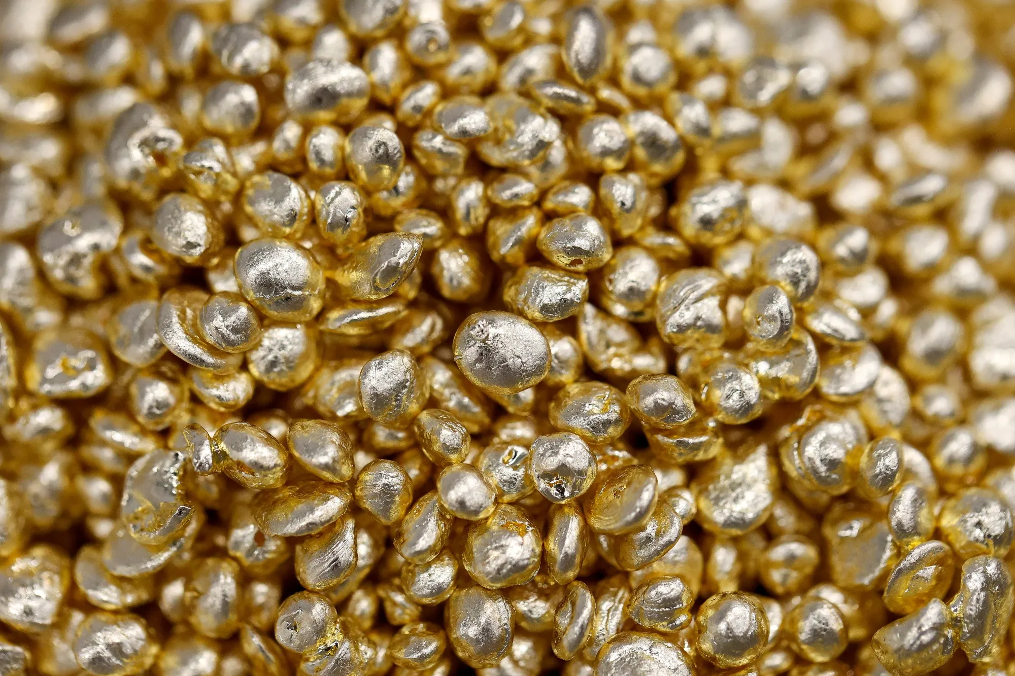 Gold casting grain in the foundry at the JSC Krastsvetmet non-ferrous metals plant in Krasnoyarsk, Russia.